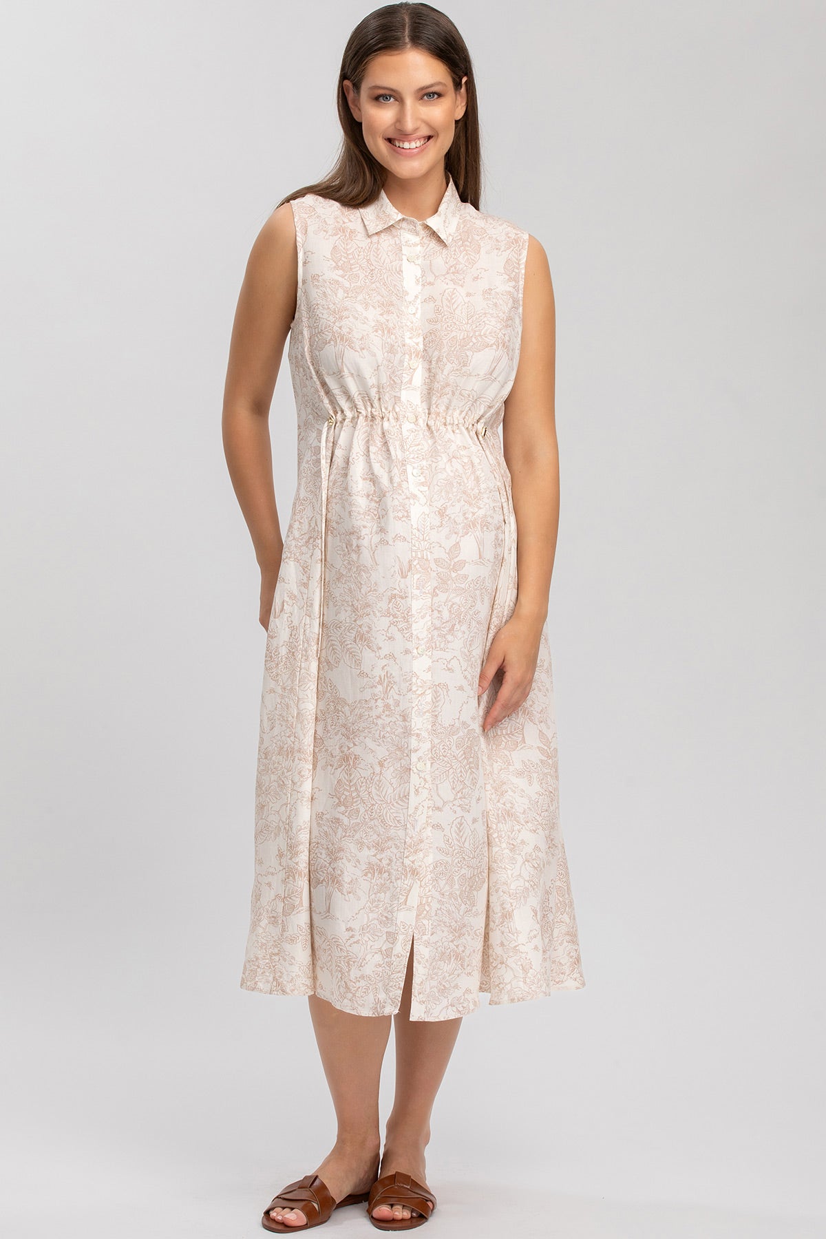 Vestito premaman smanicato beige con fantasia floreale, lunghezza midi, ideale gravidanza