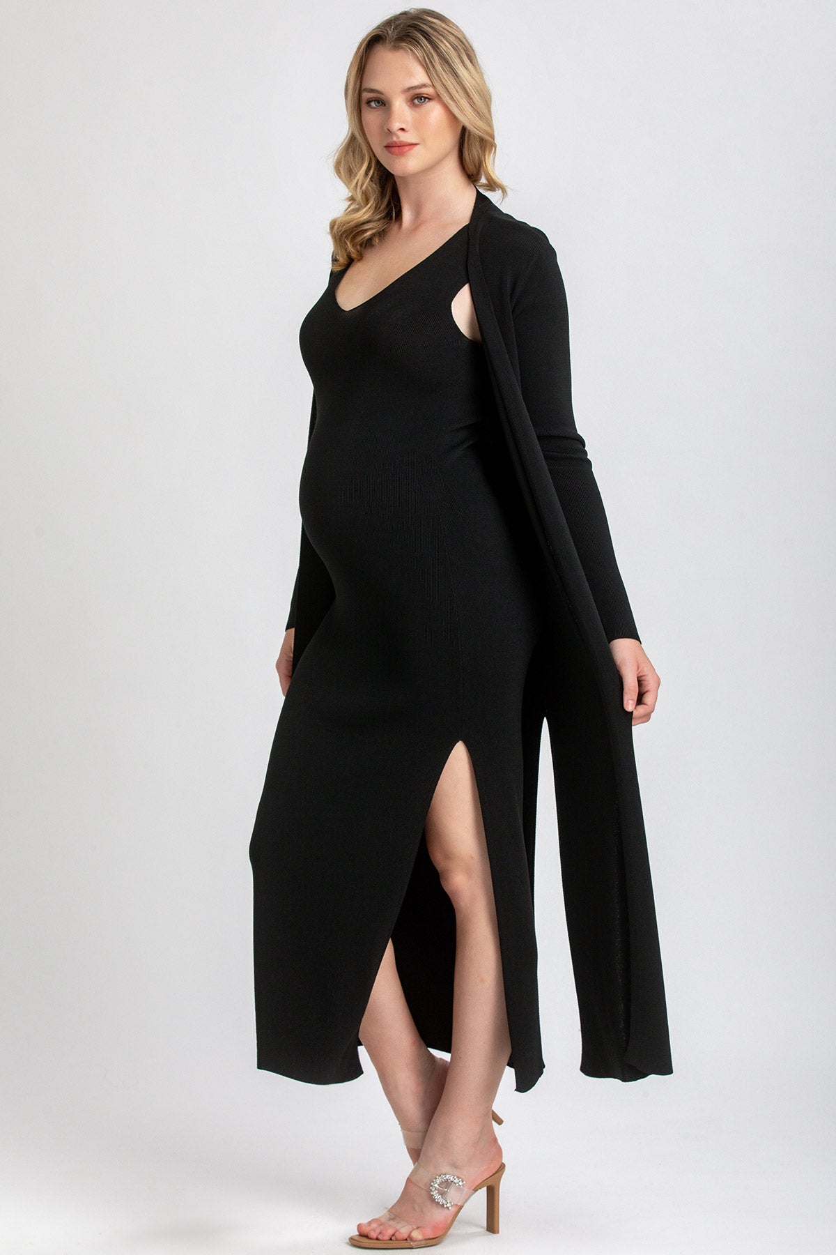 Abito premaman nero elegante con spacco laterale e cardigan coordinato