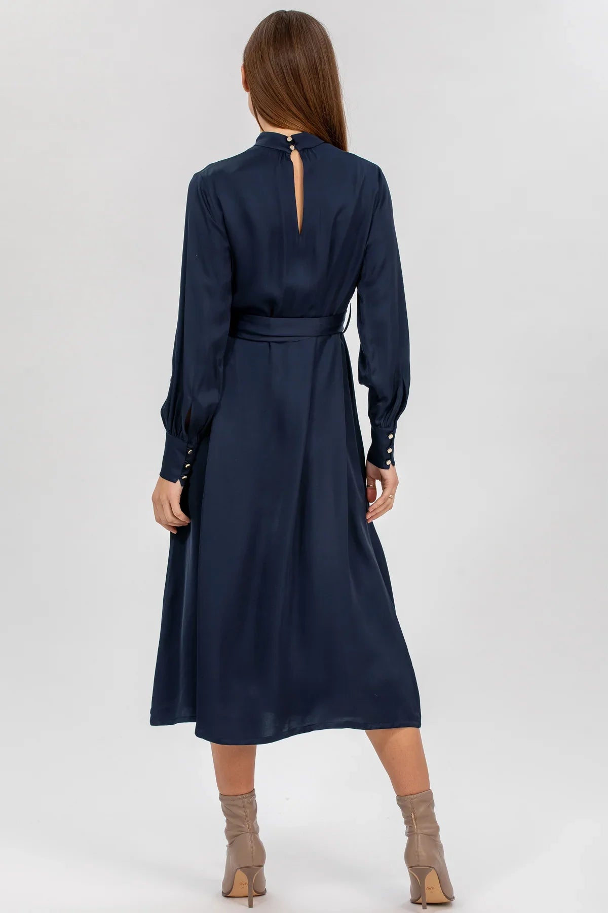 Abito premaman elegante blu notte a maniche lunghe, visto da dietro, ideale per gravidanza