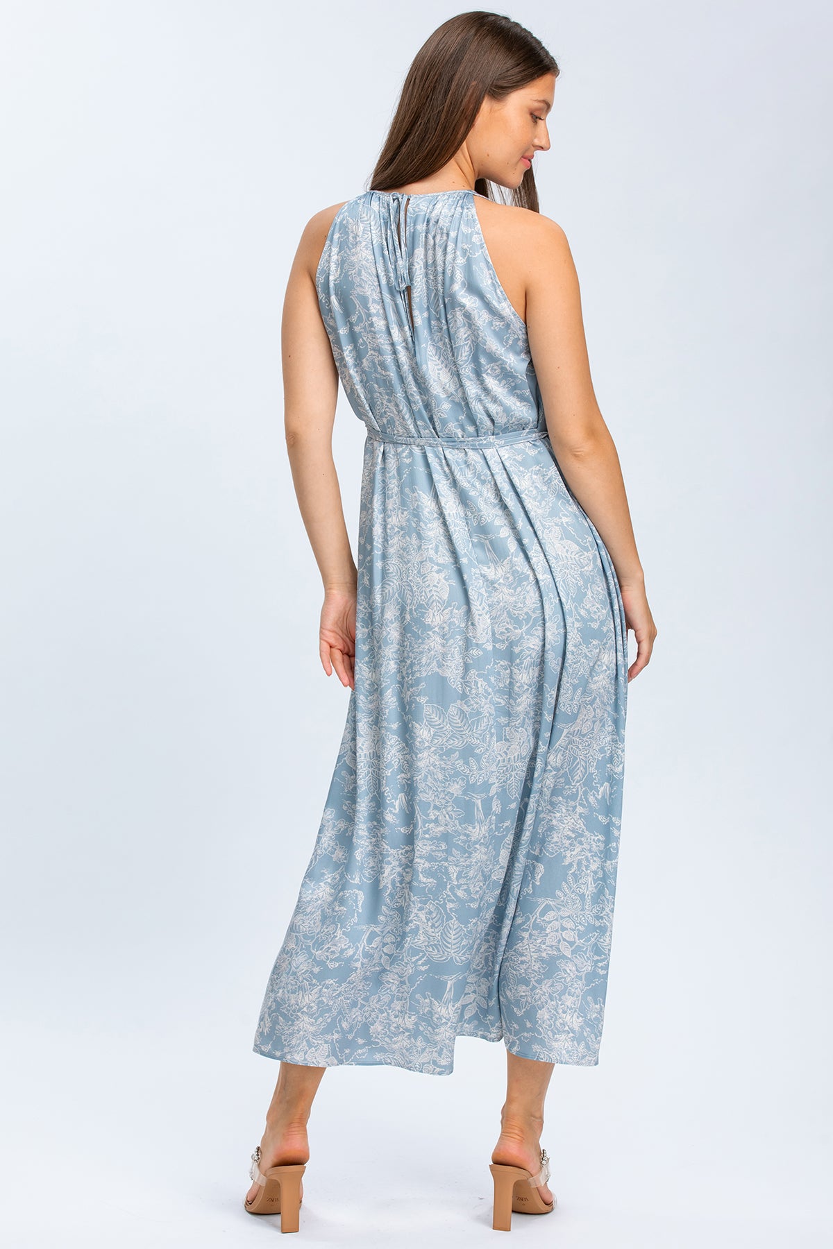 Abito premaman elegante azzurro con fantasia floreale, tessuto leggero e vestibilità comoda