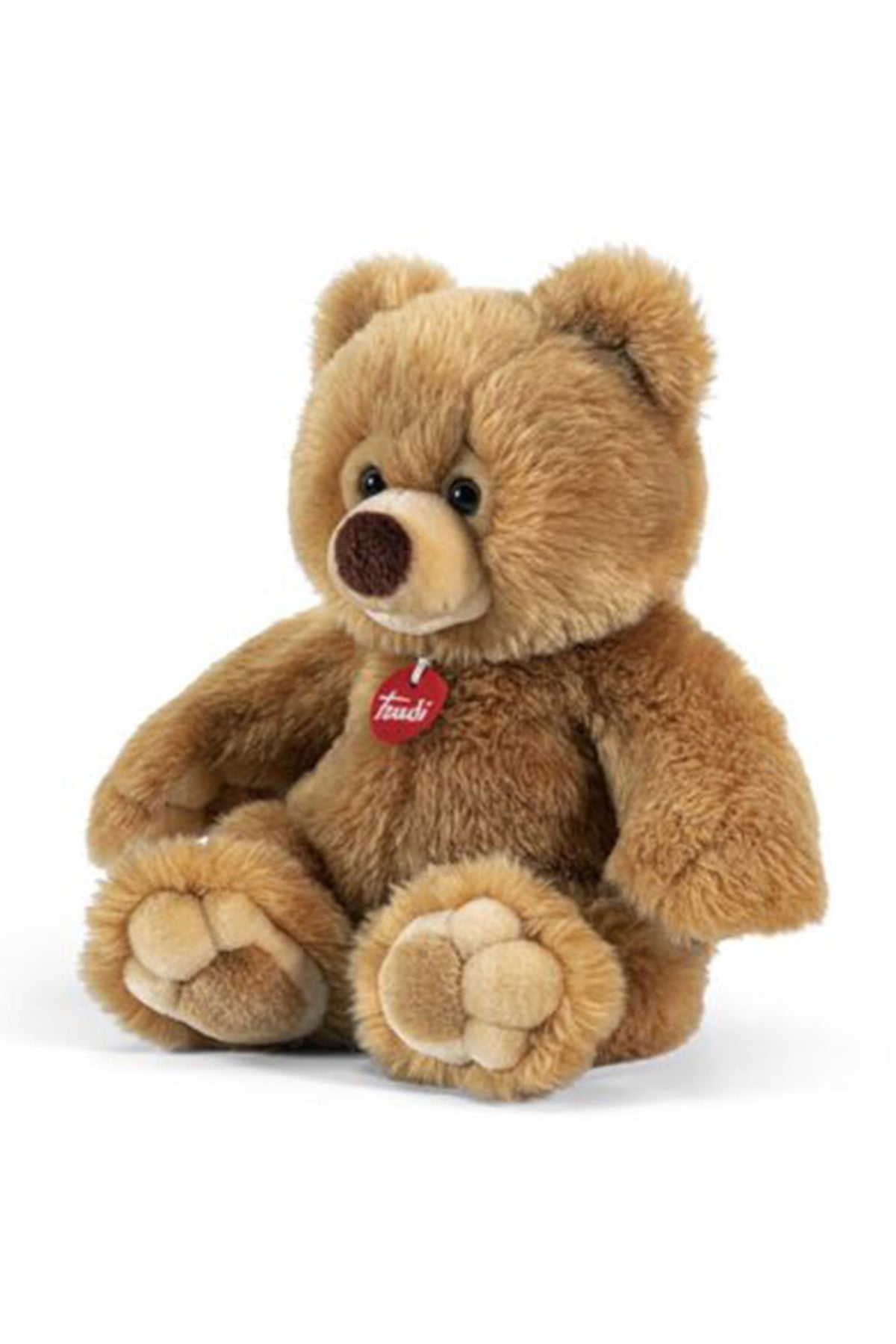 Orsetto peluche marrone seduto con medaglietta rossa, giocattolo morbido per bambini.
