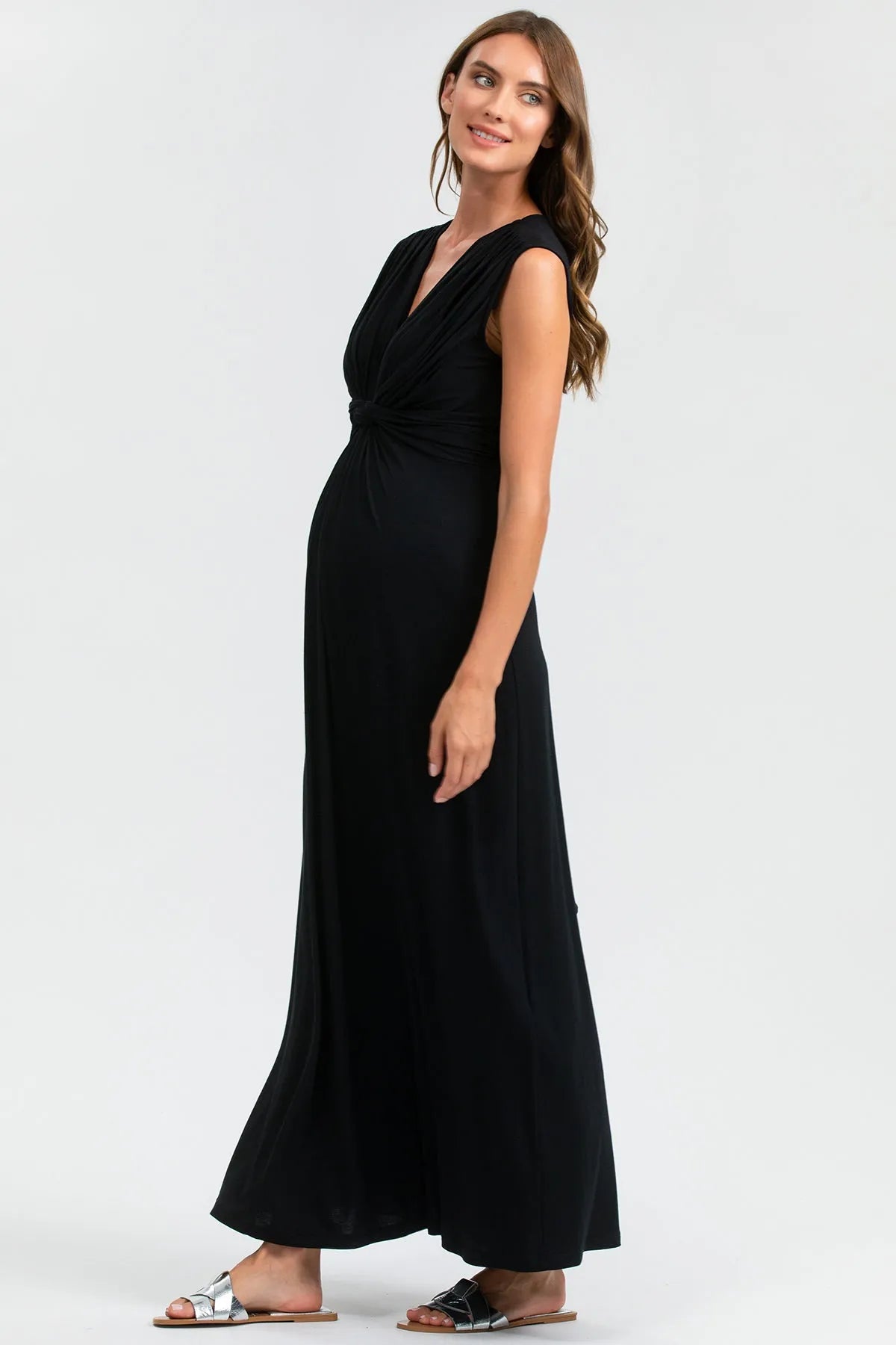 Vestito premaman elegante nero lungo senza maniche, tessuto morbido, donna incinta