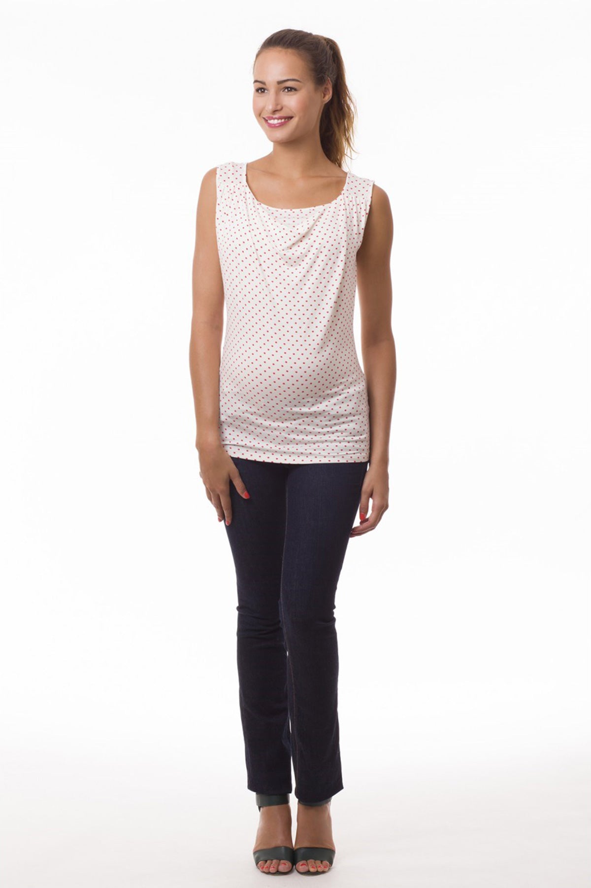 Top premaman senza maniche a pois corallo, abbigliamento gravidanza elegante